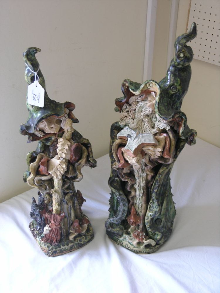 Appraisal: A pair of studio ceramic figures The Arundel Wizard and