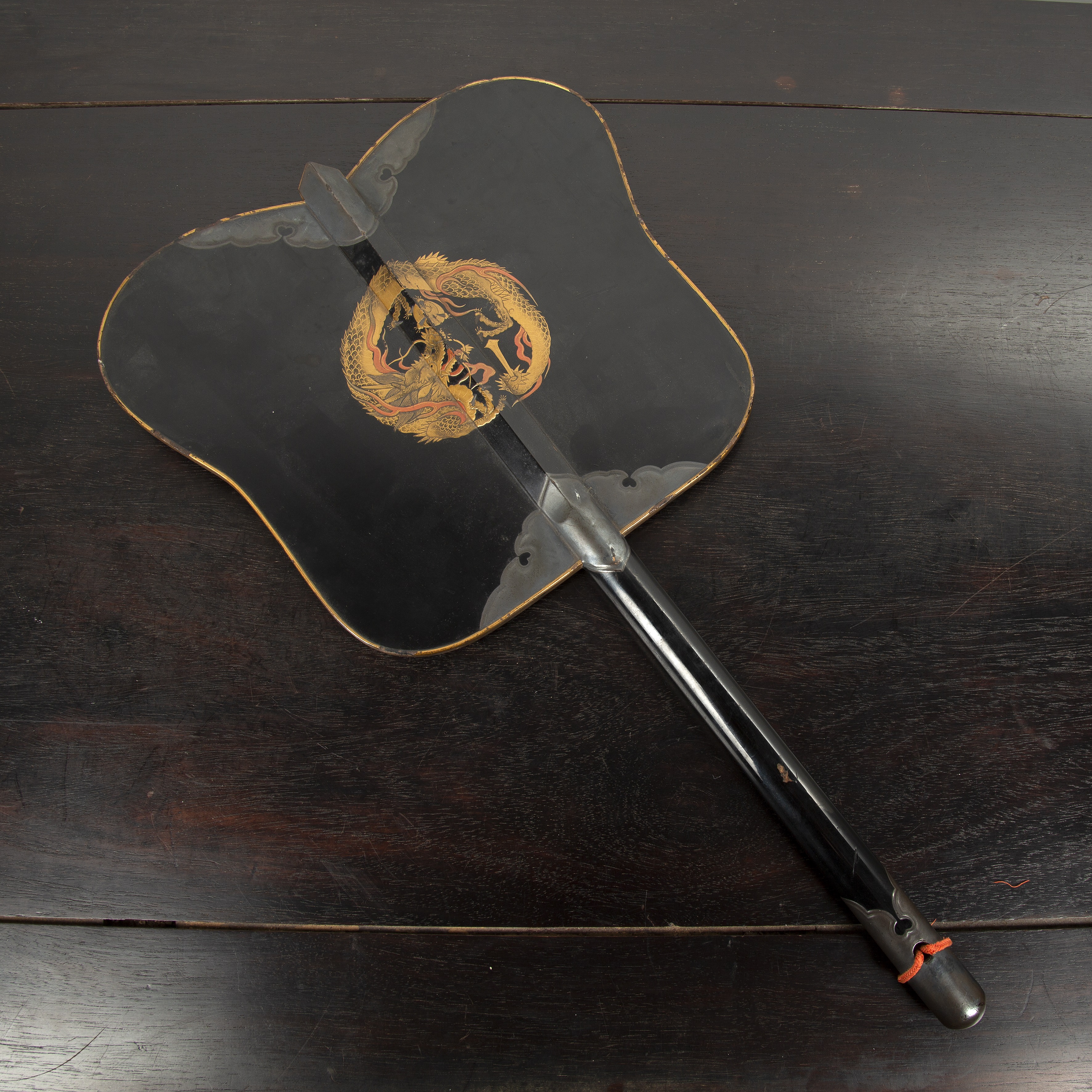 Appraisal: Black lacquer and hiramaki-e fan gunbai uchiwa Japanese Meiji period