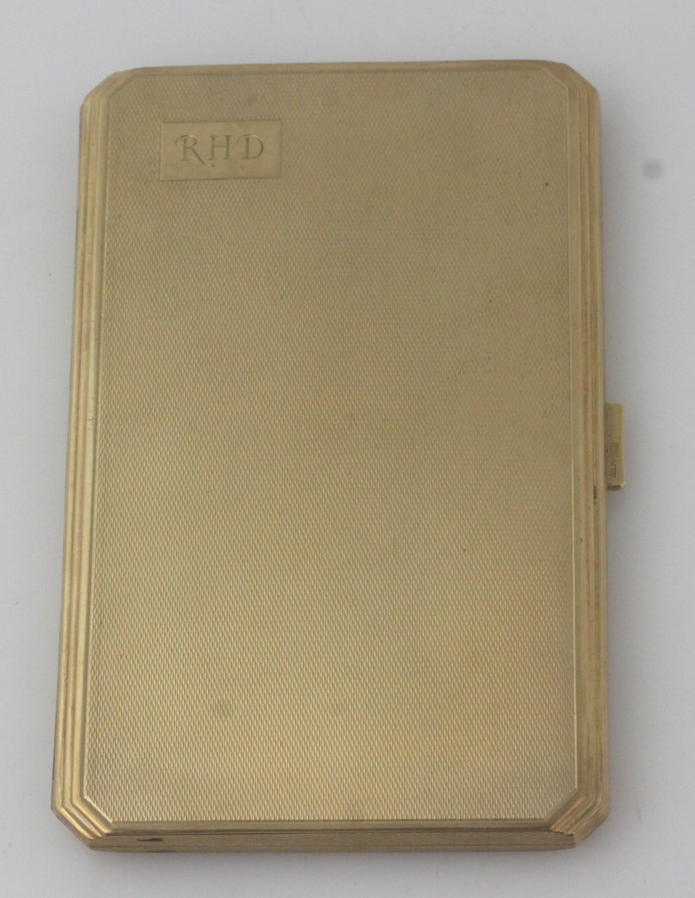 Appraisal: A ct gold cigarette case makers mark rubbed Birmingham engine