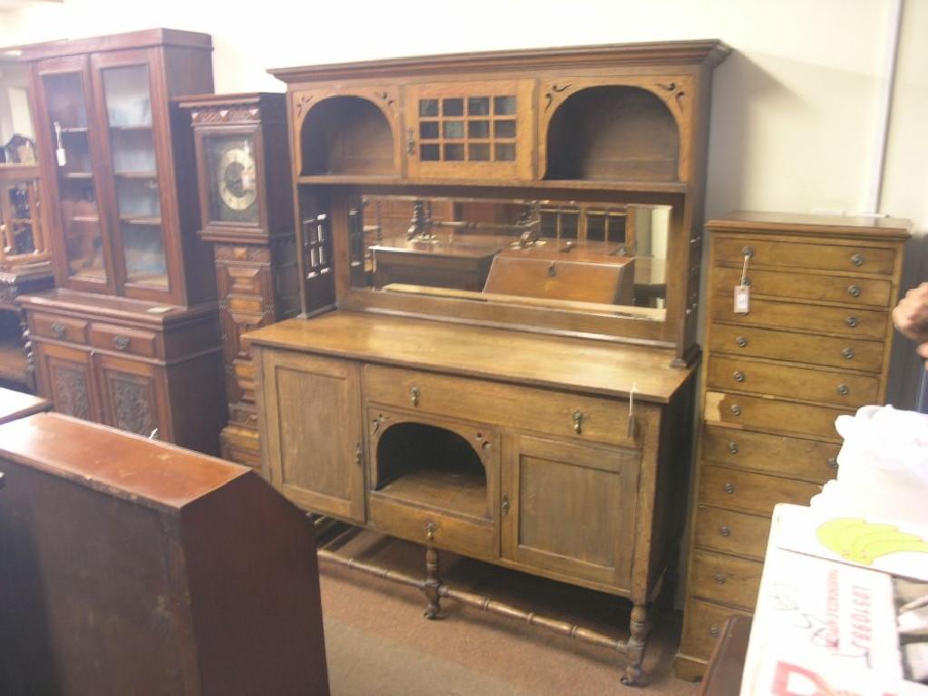 Appraisal: An Arts and Crafts oak dresser raised back with bevelled