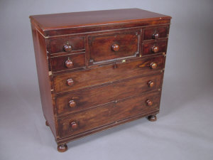 Appraisal: A mahogany Scotch chest of drawers th century with central