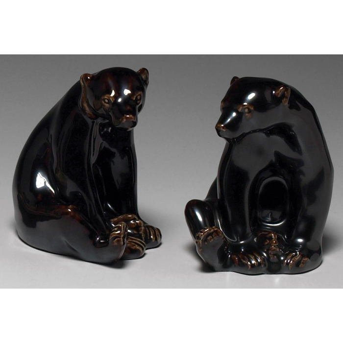 Appraisal: Rare Rookwood bookends pair seated bear covered in a brown