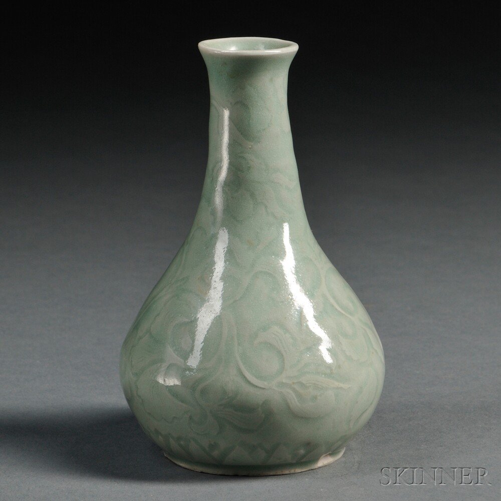 Appraisal: Miniature Celadon Vase China bottle shape molded with scrolling lotus