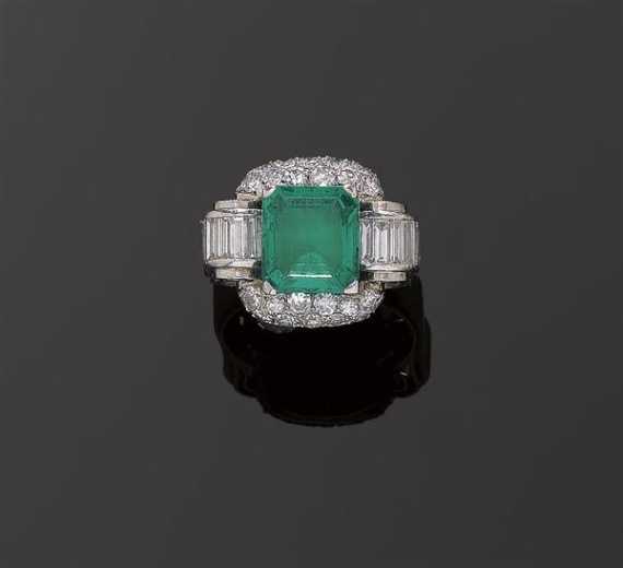 Appraisal: EMERALD AND DIAMOND RING ca Platinum Fancy ring the top