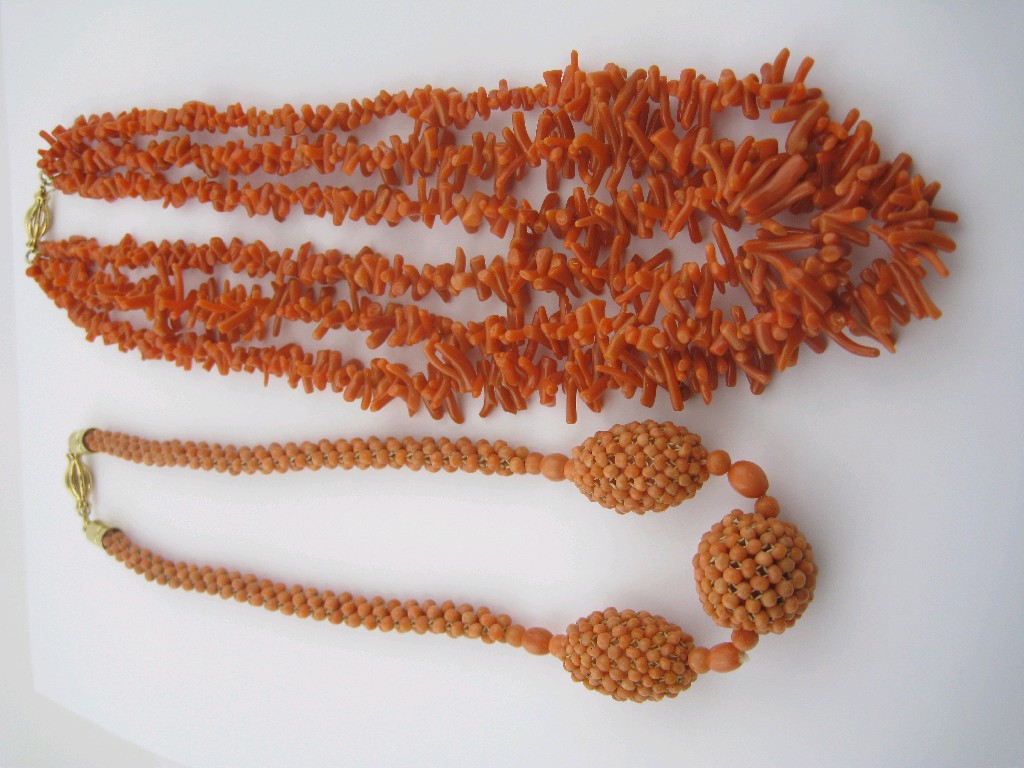 Appraisal: A red twig coral three row Necklace with wire frame