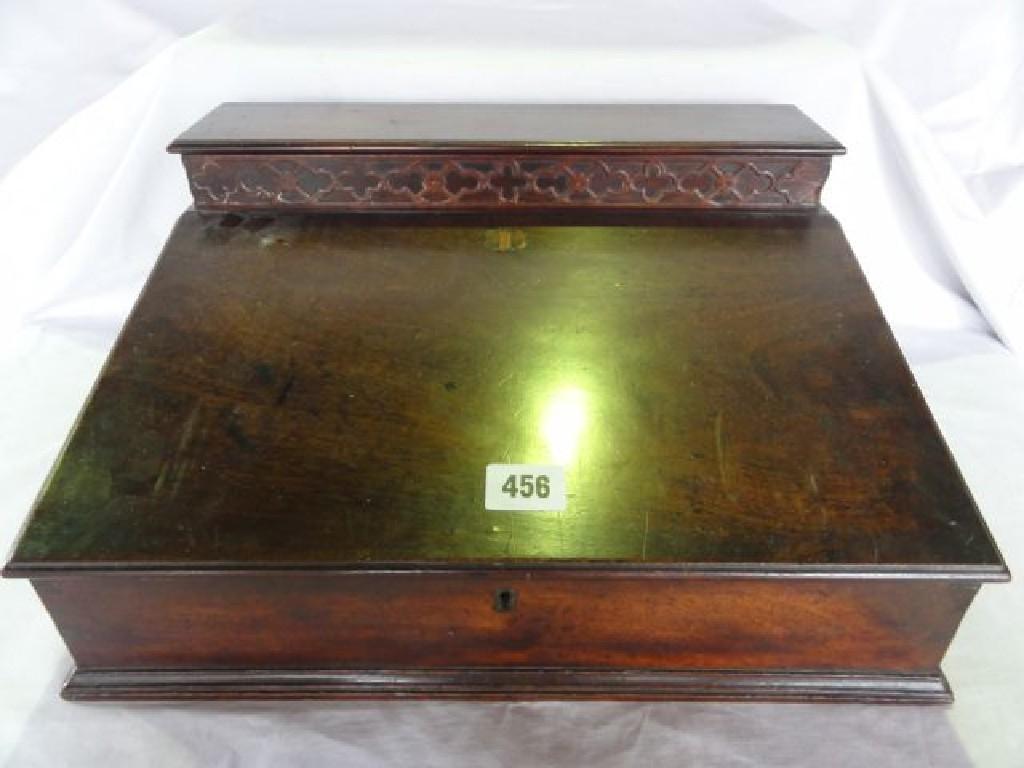 Appraisal: A late Georgian mahogany writing desk with sloping front and