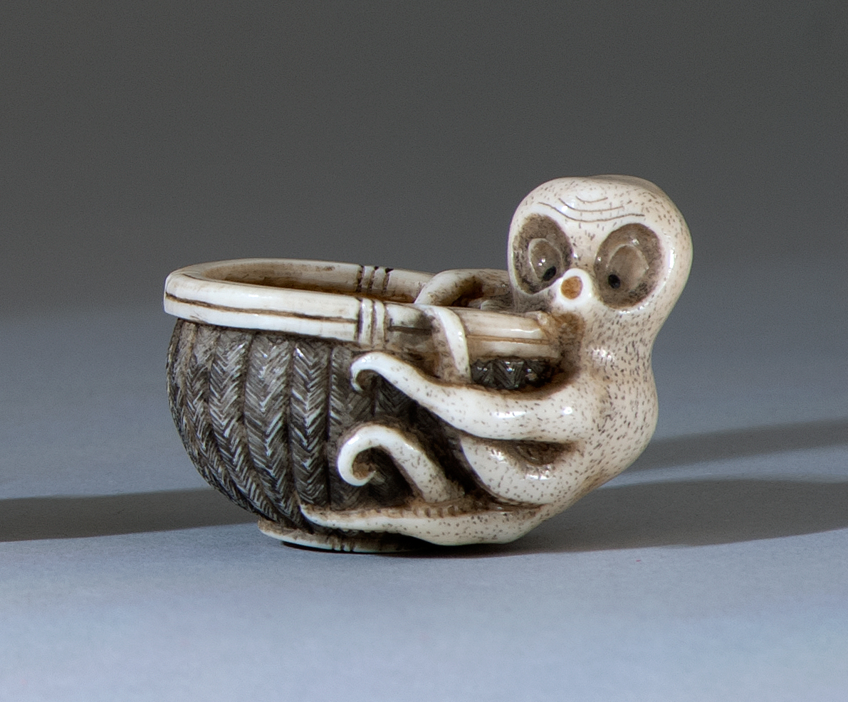 Appraisal: IVORY NETSUKE Early th CenturyIn the form of an octopus