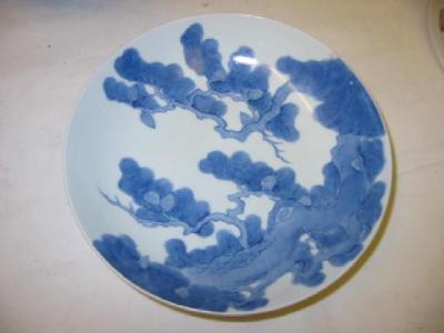 Appraisal: A JAPANESE NABESHIMA PORCELAIN DISH of shallow circular form painted