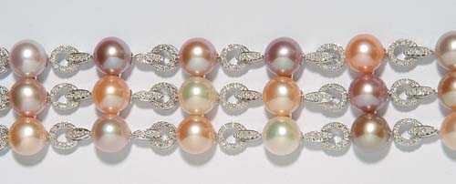 Appraisal: PEARL AND BRILLIANT-CUT DIAMOND BRACELET White gold Elegant broad bracelet