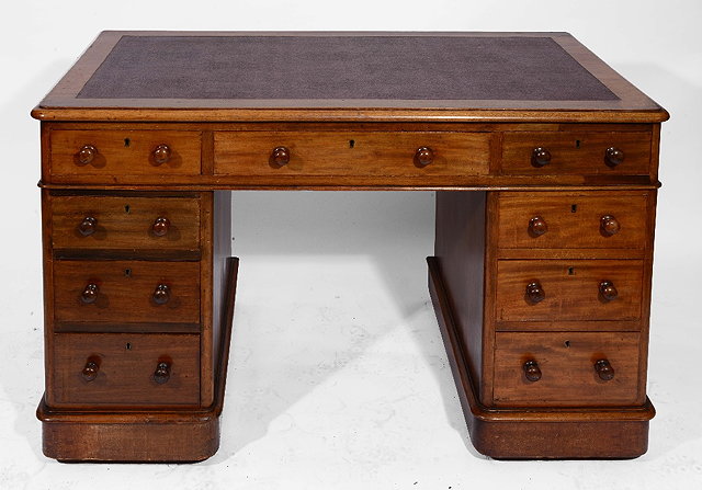 Appraisal: A VICTORIAN MAHOGANY RECTANGULAR PEDESTAL WRITING DESK fitted one long