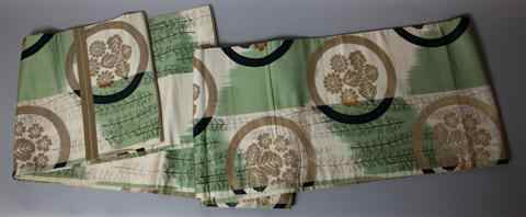 Appraisal: JAPANESE SILK BROCADE OBI th century decorated with stylized mon