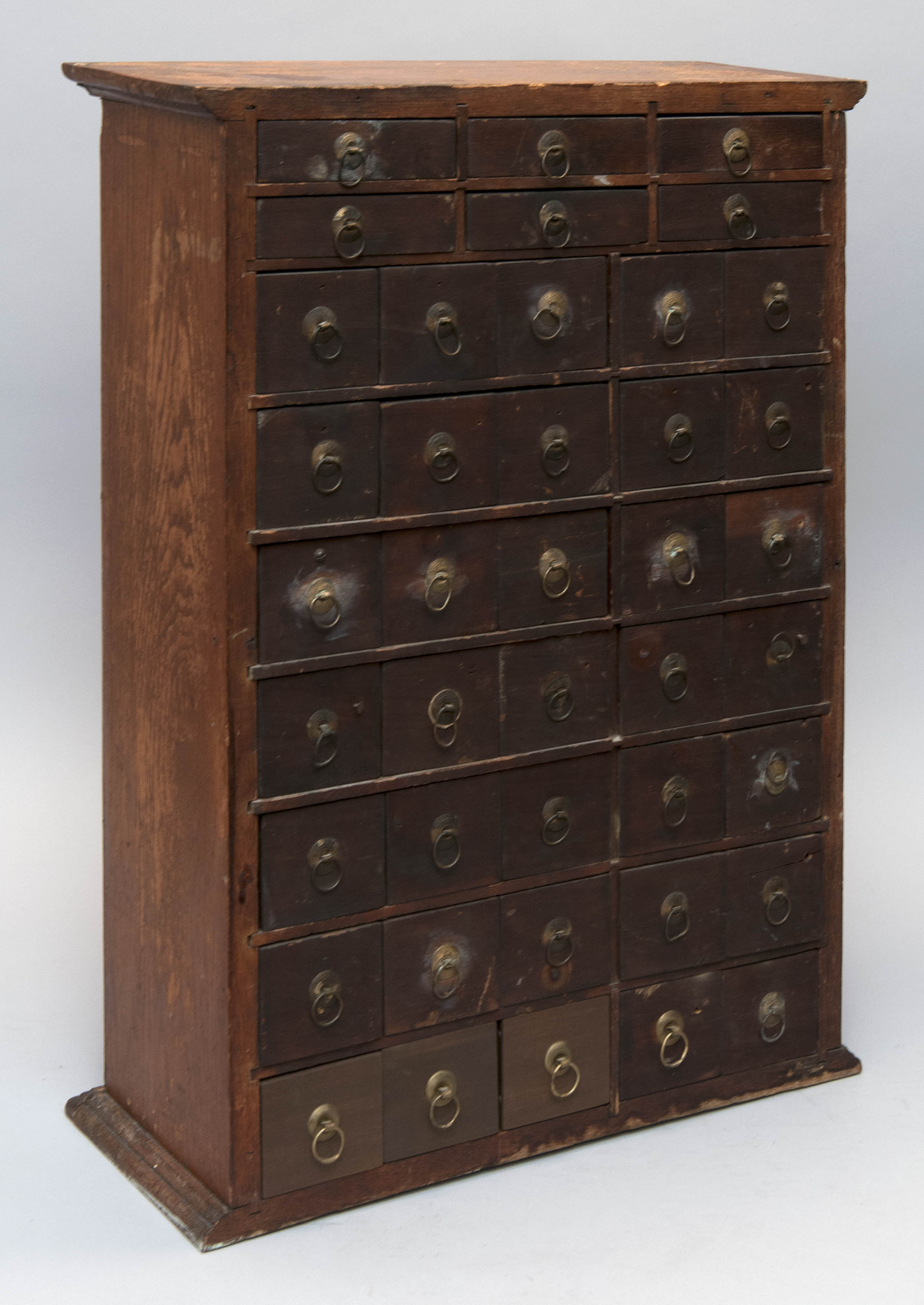 Appraisal: MUNYON'S APOTHECARY CABINET Late th Early th CenturyIn chestnut Forty-one