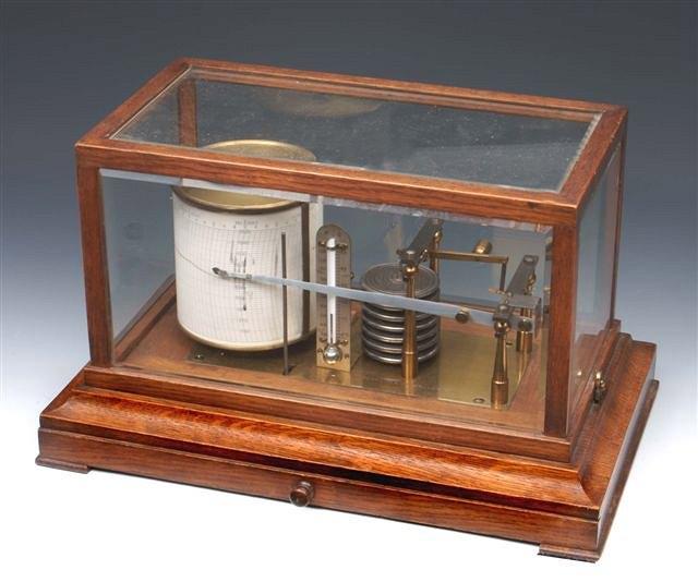 Appraisal: AN NEGRETTI AND ZAMBRA OF LONDON OAK CASED BAROGRAPH across