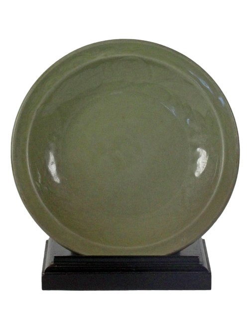 Appraisal: A Ming Dynasty celadon shallow bowl th Century incised with