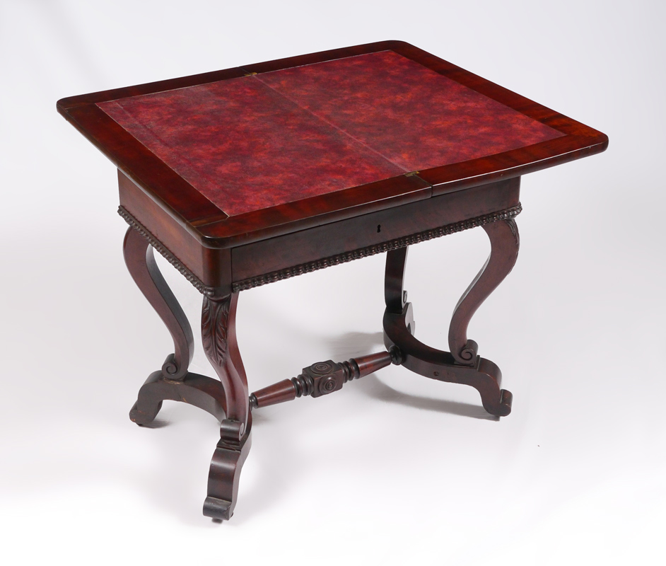 Appraisal: TH CENTURY MAHOGANY GAME TABLE Top swivels to reveal compartments