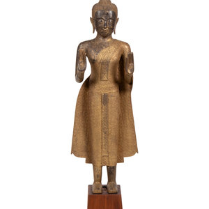 Appraisal: A Large Thai Gilt Decorated Bronze Figure of Standing Buddha