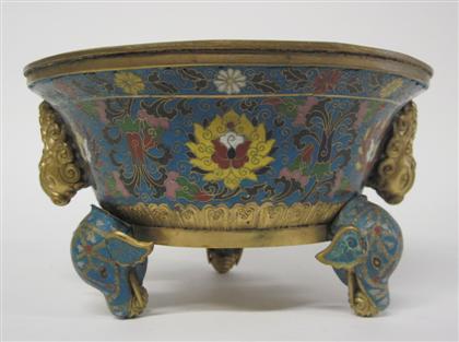 Appraisal: Chinese cloisonne and gilt bronze mounted tripod censerBlue ground censer