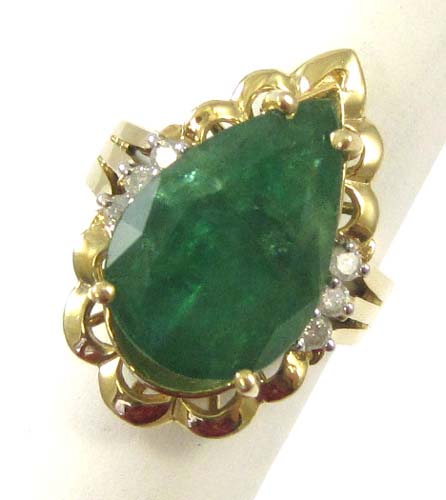 Appraisal: EMERALD DIAMOND AND FOURTEEN KARAT GOLD RING set with six