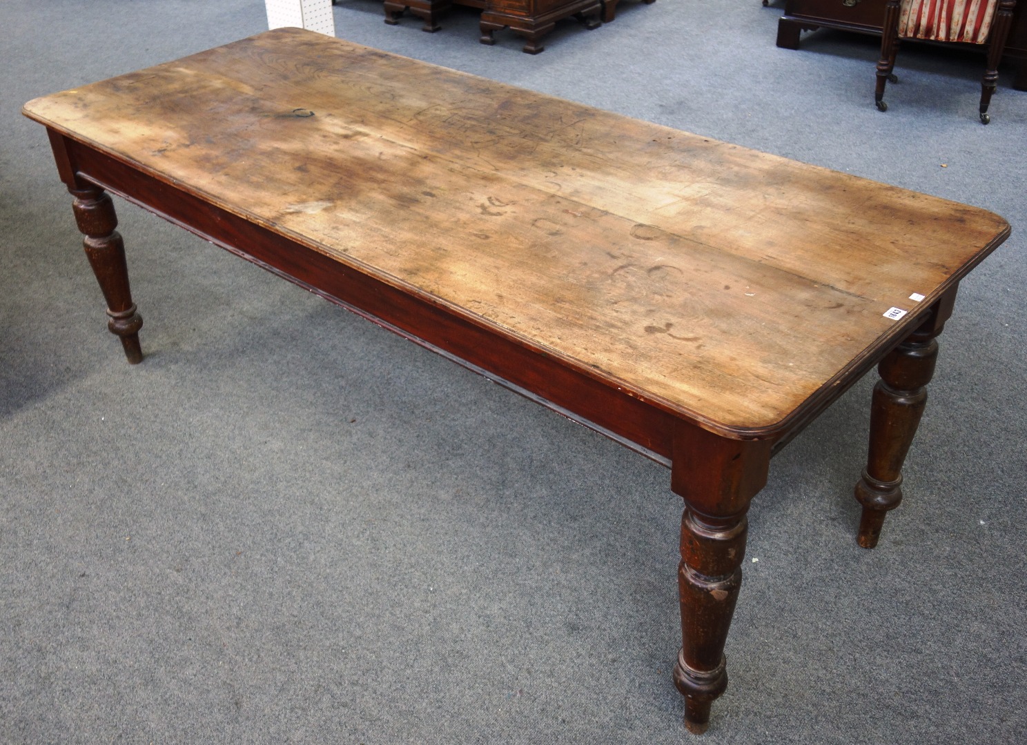 Appraisal: A th century fruitwood and mahogany rectangular kitchen table on