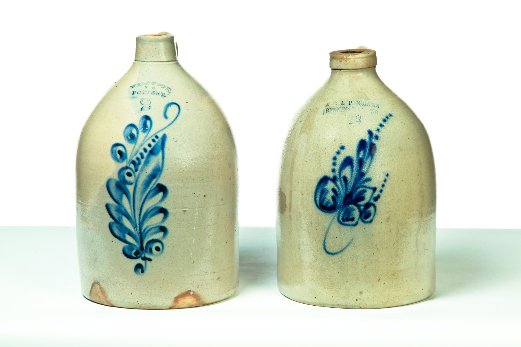 Appraisal: TWO AMERICAN STONEWARE JUGS Second half- th century Impressed labels