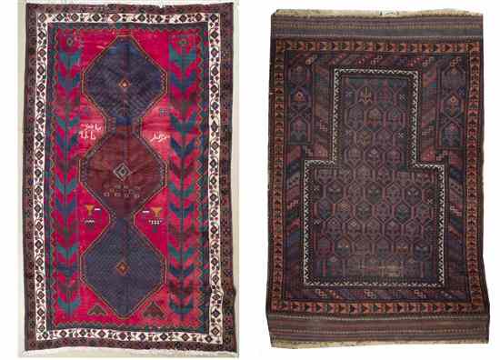 Appraisal: Two Persian Wool Rugs having three repeating geometric medallions set