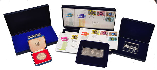 Appraisal: A COMMEMORATIVE SILVER STAMP celebrating the silver jubilee together with