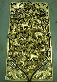 Appraisal: A carved pierced guilded temple panel featuring sacred animals in