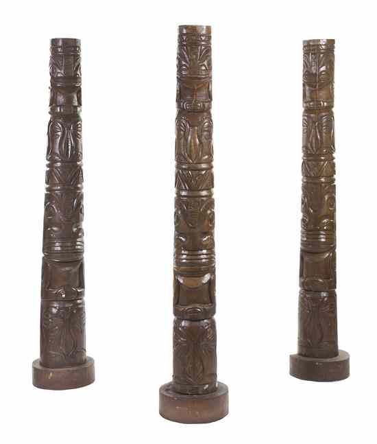 Appraisal: Three Carved Wood Tiki Totems each of cylindrical form depicting