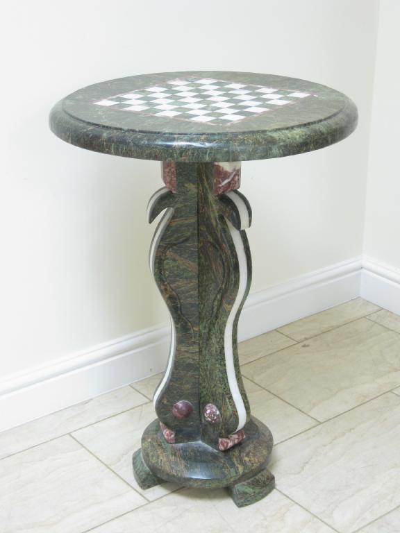 Appraisal: A Games Table with circular inlaid black and white marble