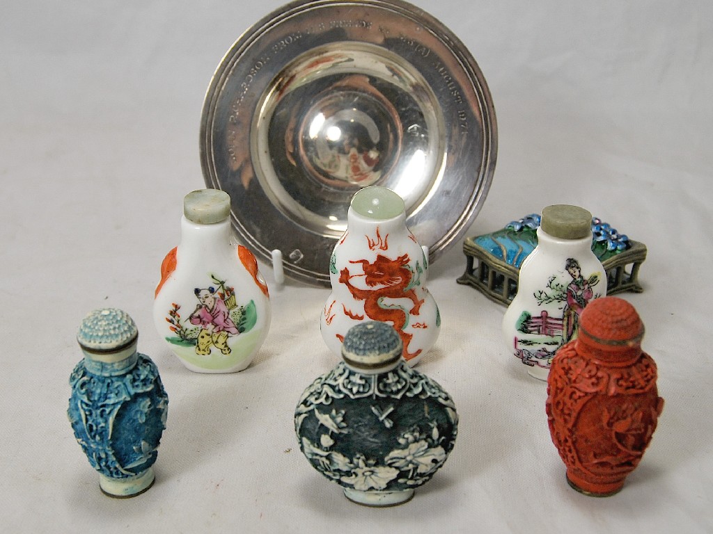 Appraisal: Three Chinese porcelain snuff bottles and three carved lacquer examples