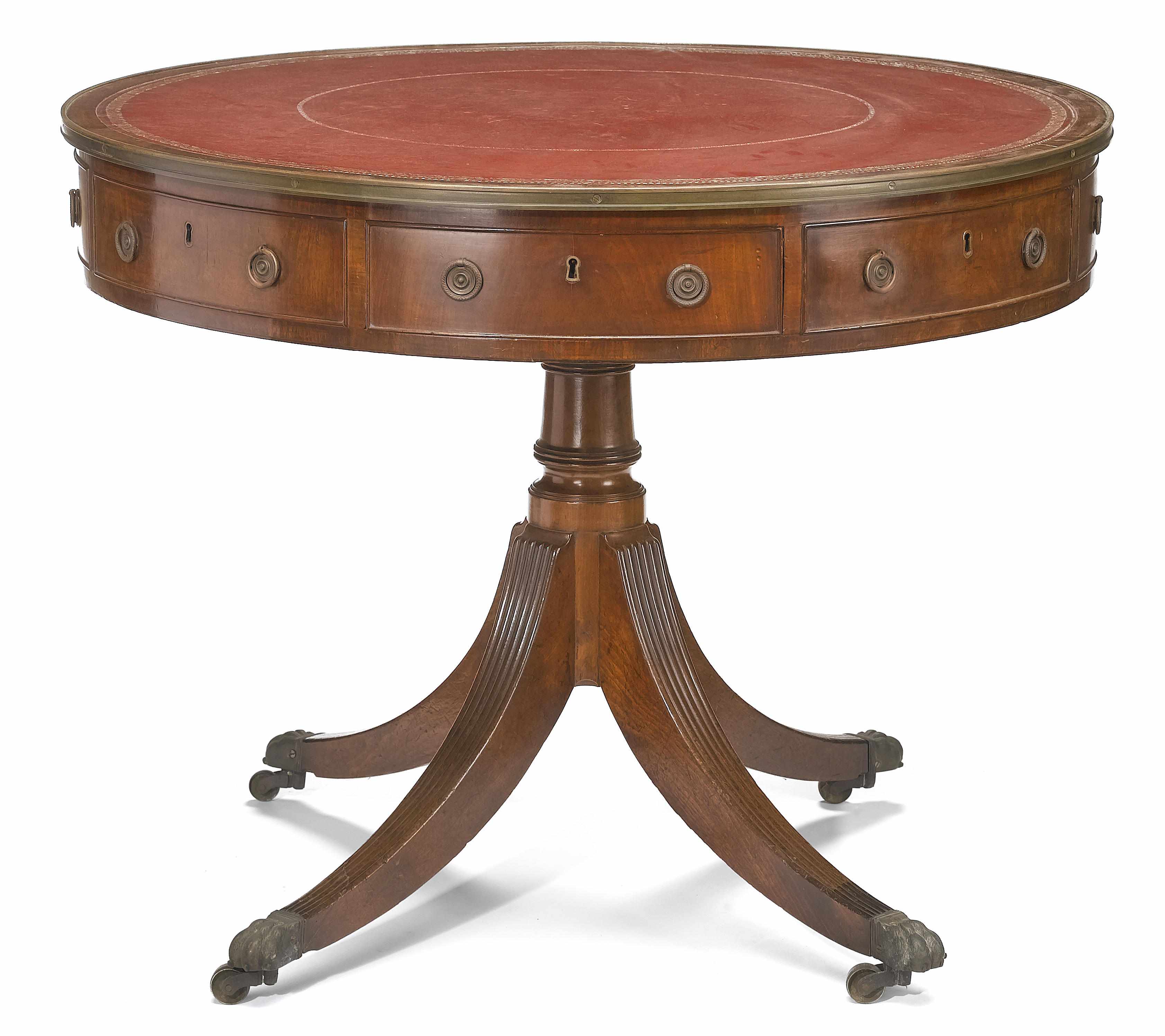 Appraisal: A George III mahogany brass mounted drum table fourth quarter