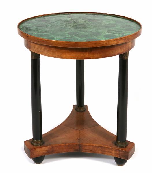 Appraisal: An Empire style parcel ebonized and walnut table th century