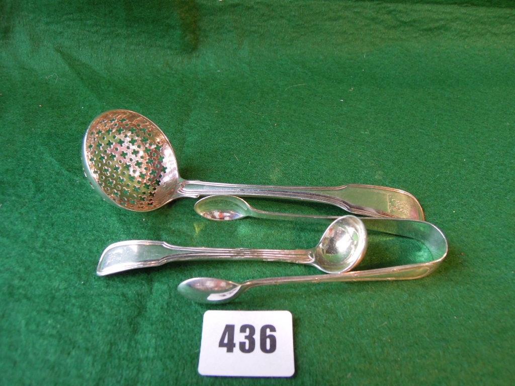 Appraisal: A George III silver caster spoon London a pair of