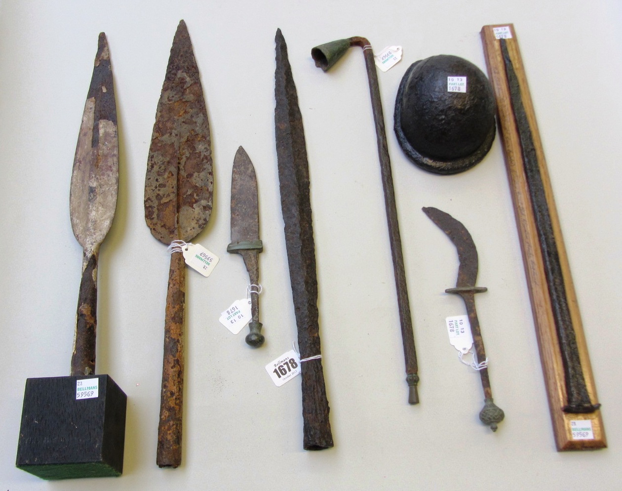 Appraisal: A group of Roman iron weapons and tools including a