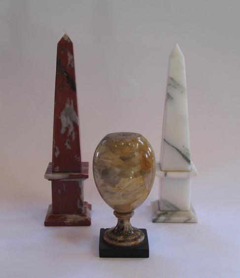 Appraisal: A VEINED RED MARBLE OBELISK with black and white veins