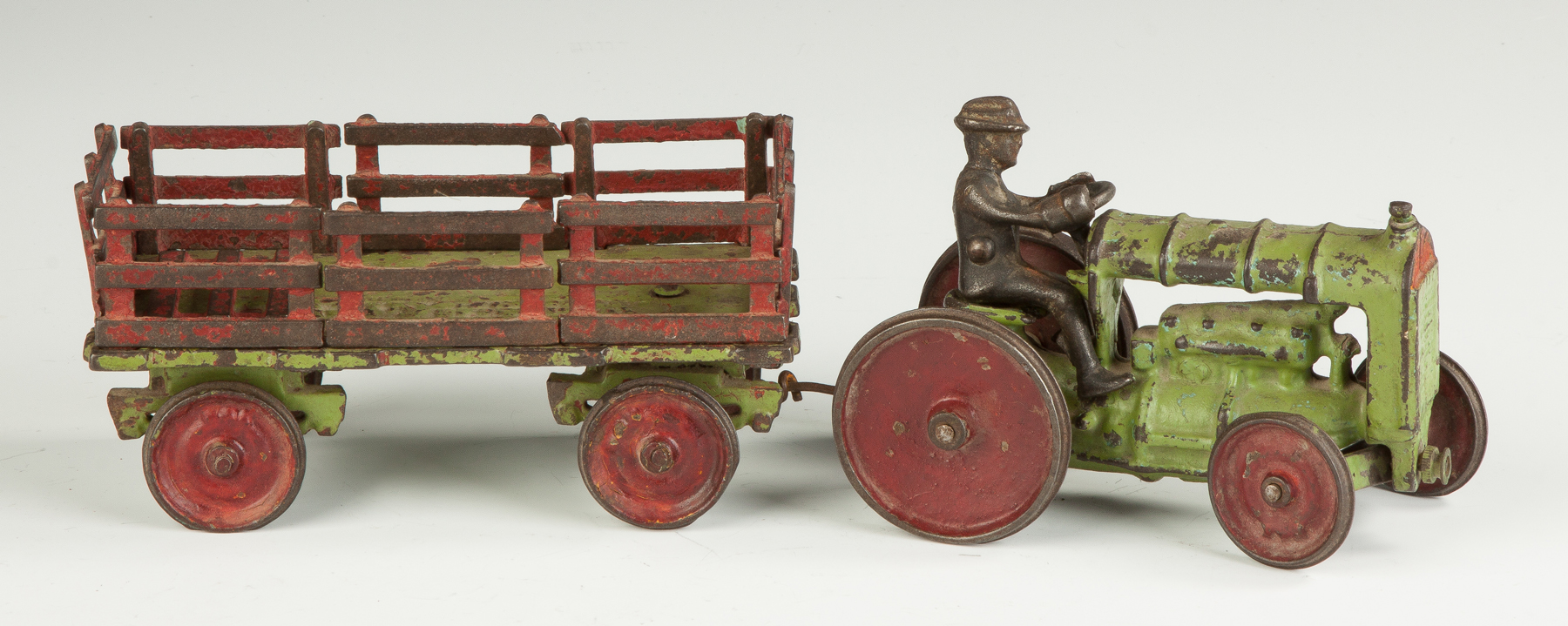 Appraisal: Painted Cast Iron Tractor Cart Sgn Wilkinson K Co