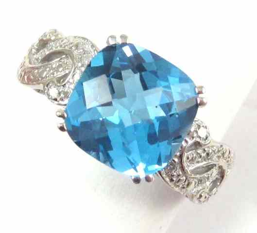 Appraisal: BLUE TOPAZ DIAMOND AND WHITE GOLD RING k gold with