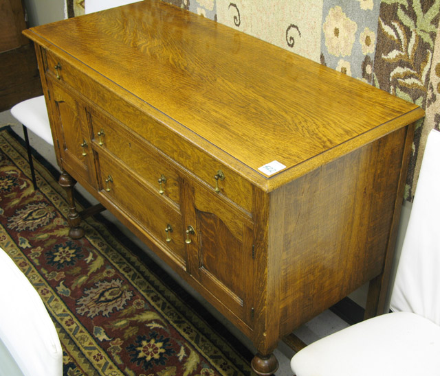 Appraisal: AN OAK BUFFET William Mary Revival design American c the