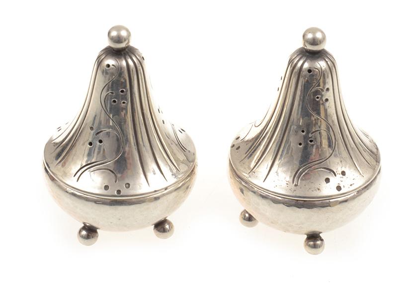 Appraisal: A PAIR OF SALT AND PEPPER SHAKERS BY GEORG JENSEN