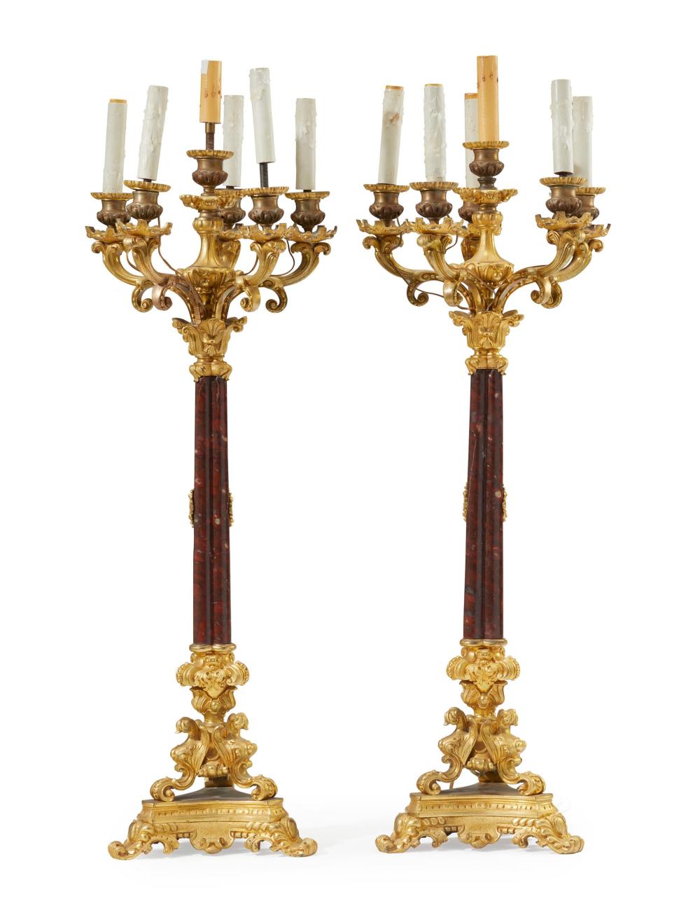 Appraisal: A pair of gilt-bronze and marble candle lamps th Century