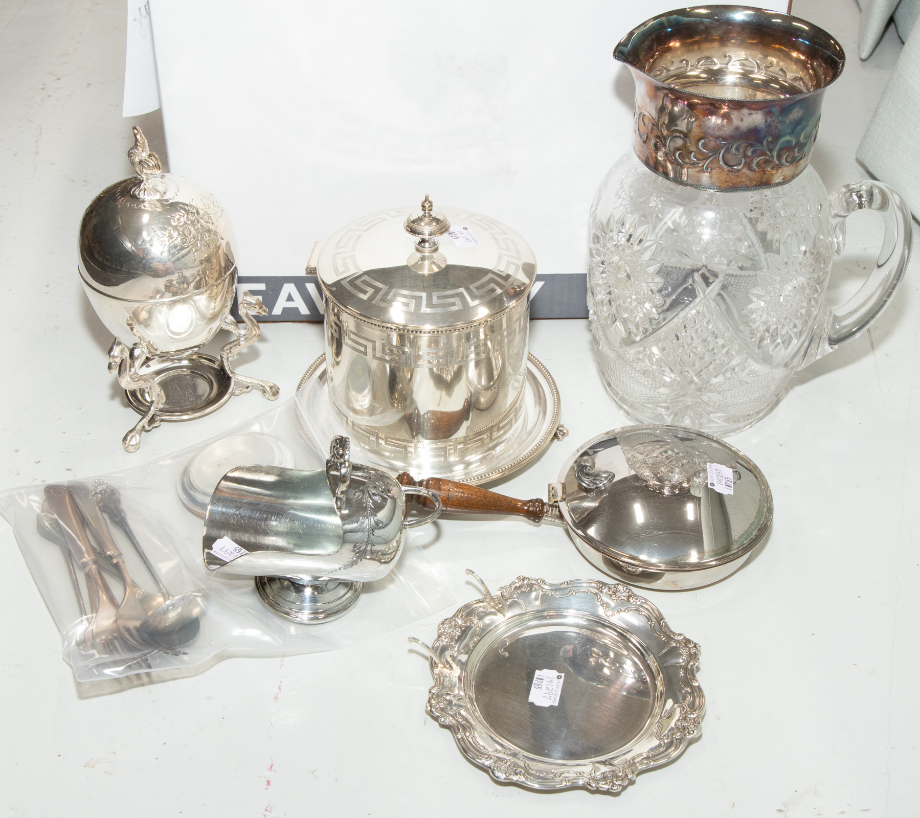 Appraisal: GROUP SILVER PLATED HOLLOWWARE Including biscuit barrel water pitcher two