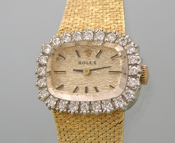 Appraisal: A Ladies' Diamond and Gold Watch by Rolex k yellow