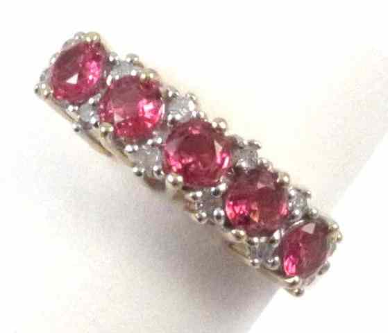 Appraisal: RUBY DIAMOND AND FOURTEEN KARAT GOLD RING set with five