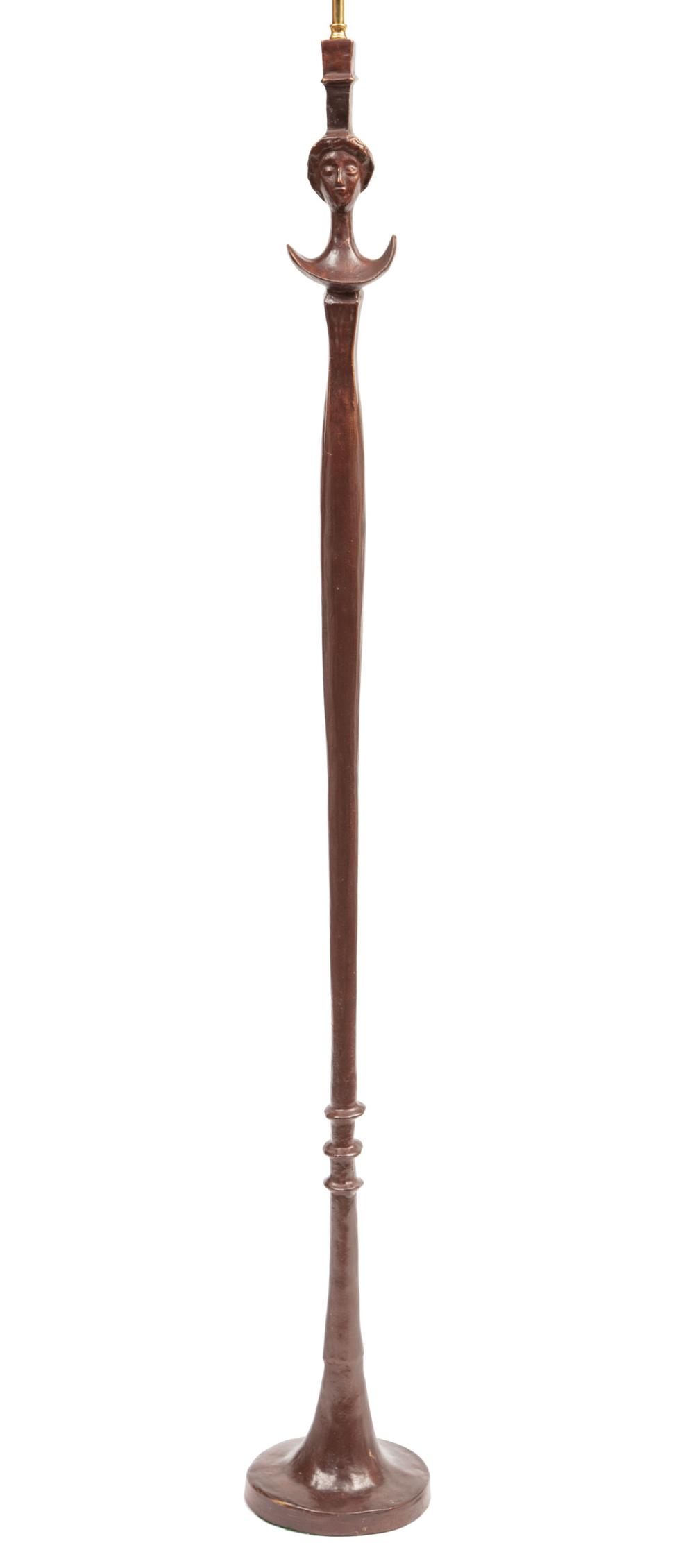 Appraisal: Giacometti-Style Tete de Femme Floor Lamp bronze-finished composite h to