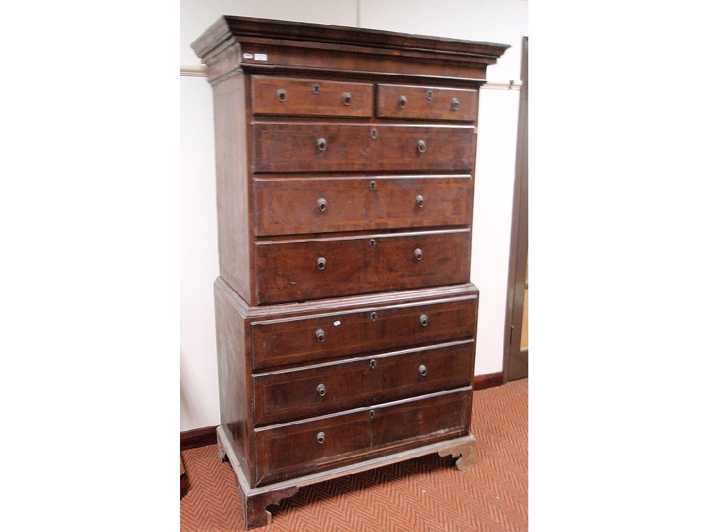 Appraisal: An early Georgian walnut chest on chest with deep moulded