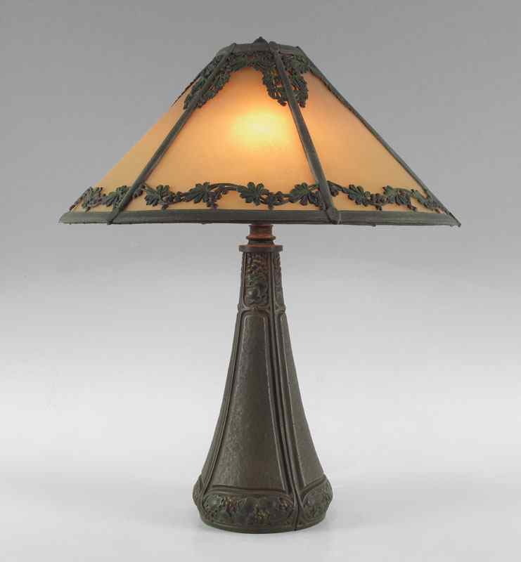 Appraisal: BRADLEY HUBBARD LINEN PANEL LAMP Bears the triangle logo Six