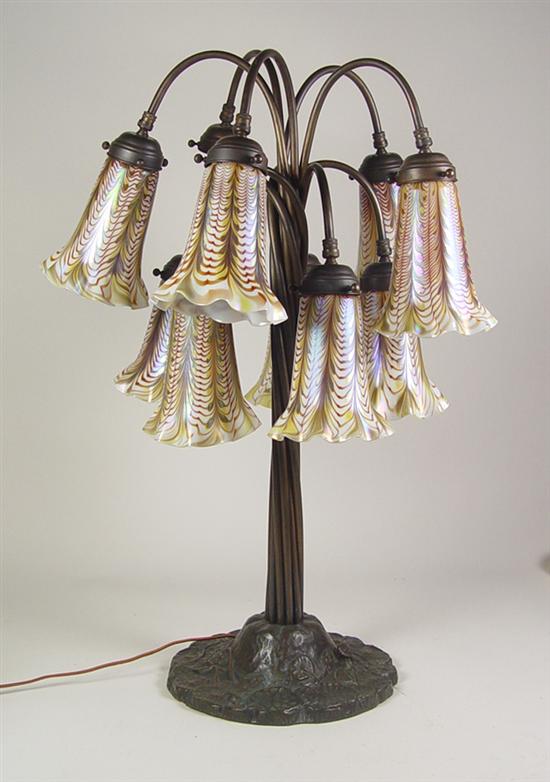 Appraisal: Tiffany Style Bronze Table Lamp th Century Bronze ten-lamp cluster