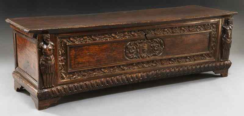 Appraisal: th C Italian carved walnut cassoneof six board construction the