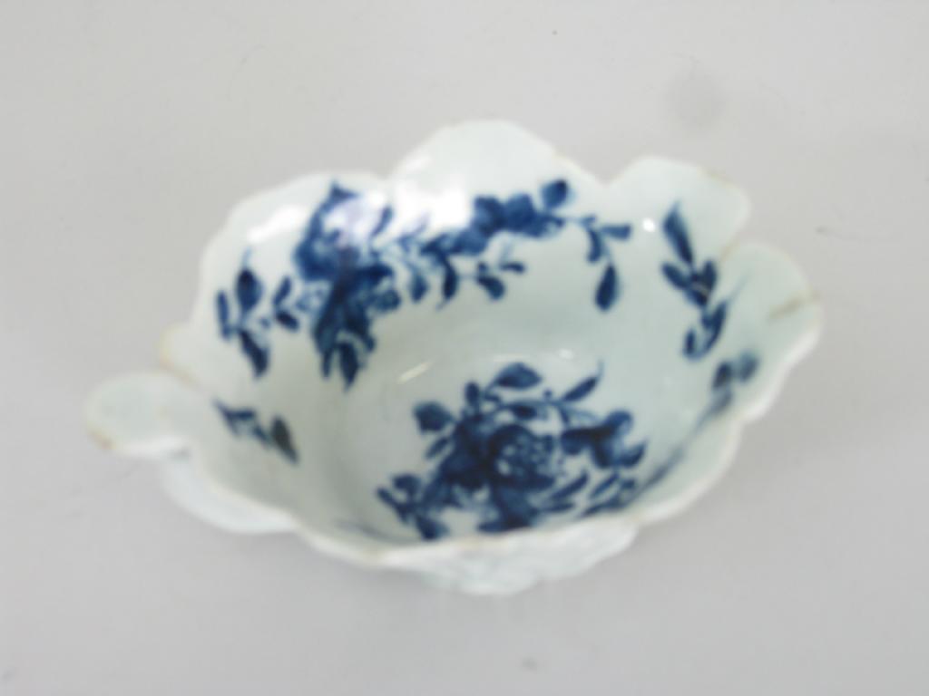 Appraisal: An th Century Worcester blue and white moulded Butter Boat