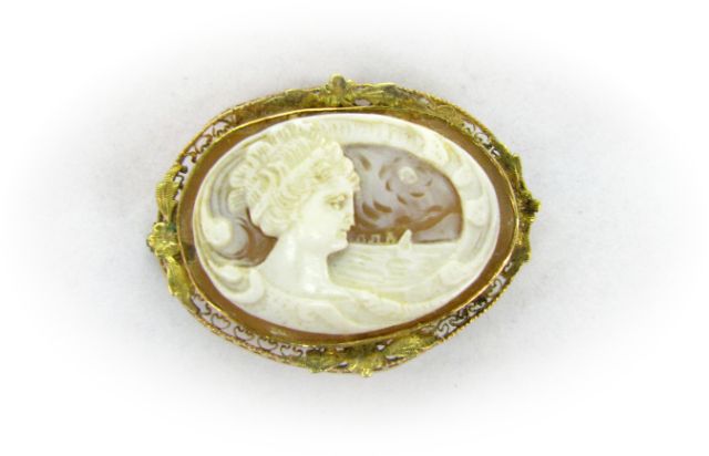 Appraisal: Vintage Cameo set in K yellow gold filigree style pin